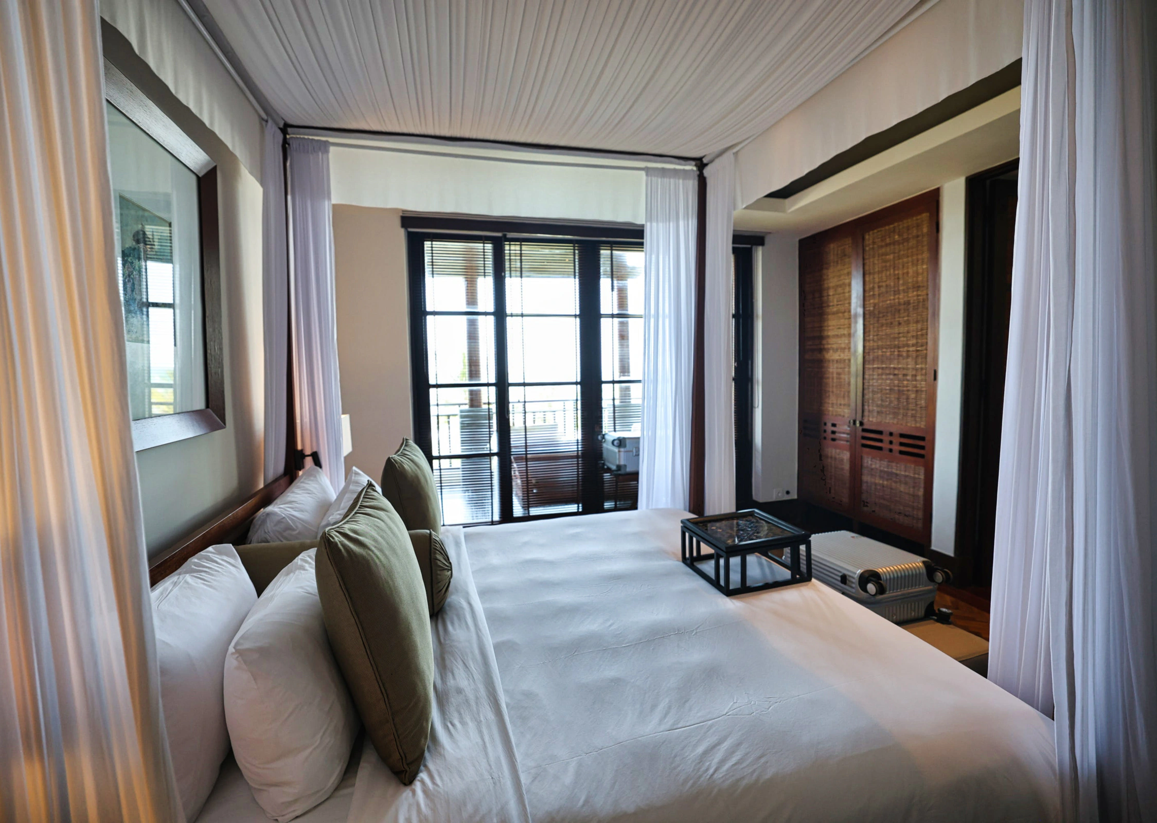Master bedroom interior with a large king bed