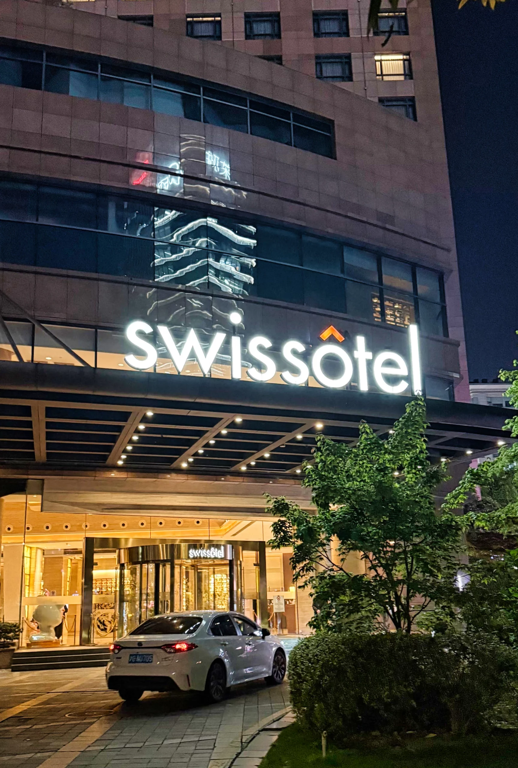 Luxury hotel exterior in a bustling city