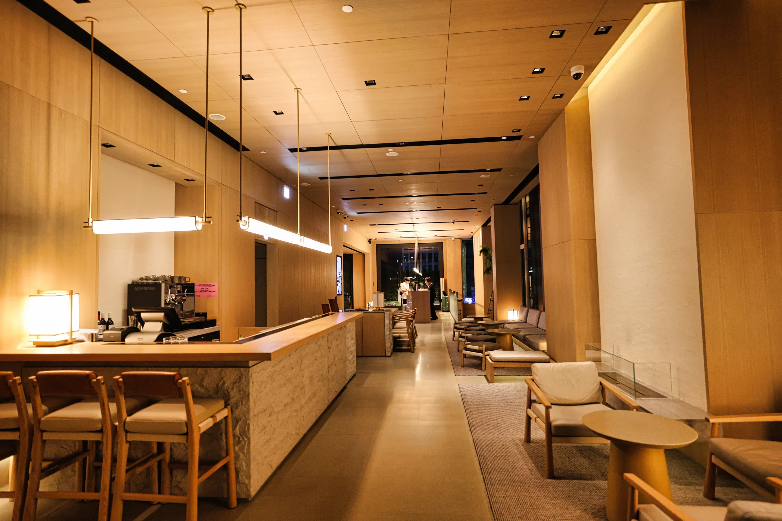 Coworking-style lobby lounge at AKI Hong Kong