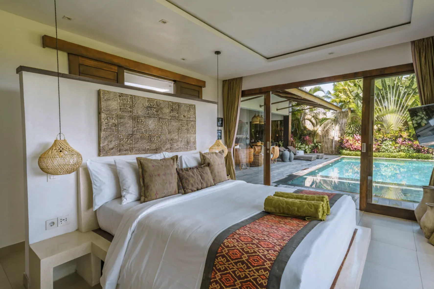 A stunning aerial view of K Club Ubud's pool villas nestled in the jungle.