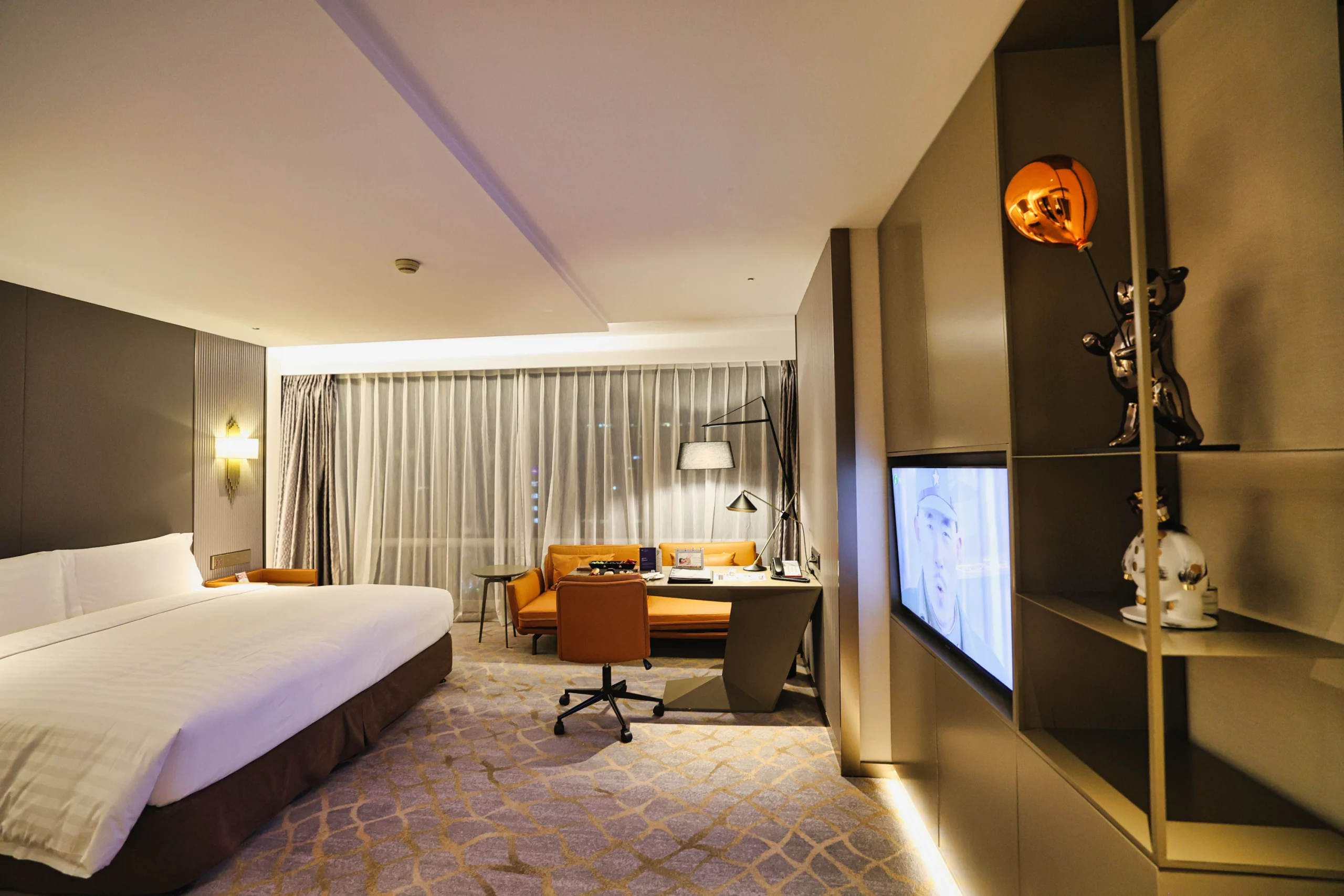 A view of the king-sized bed and nightstands.