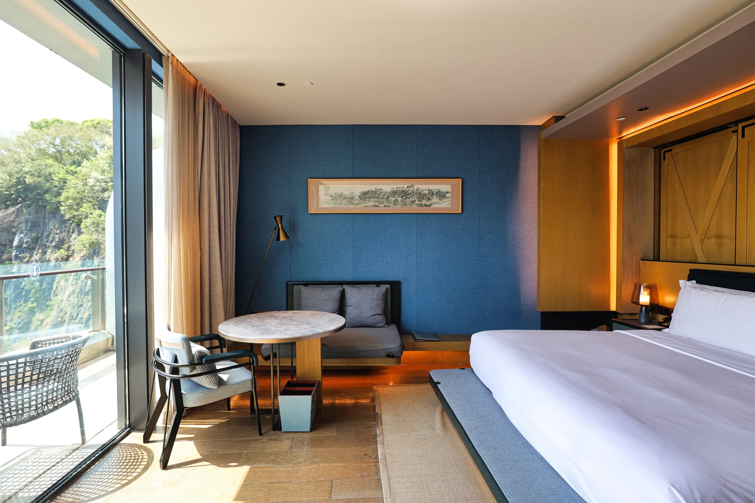 Well-appointed guest room with wood accents.