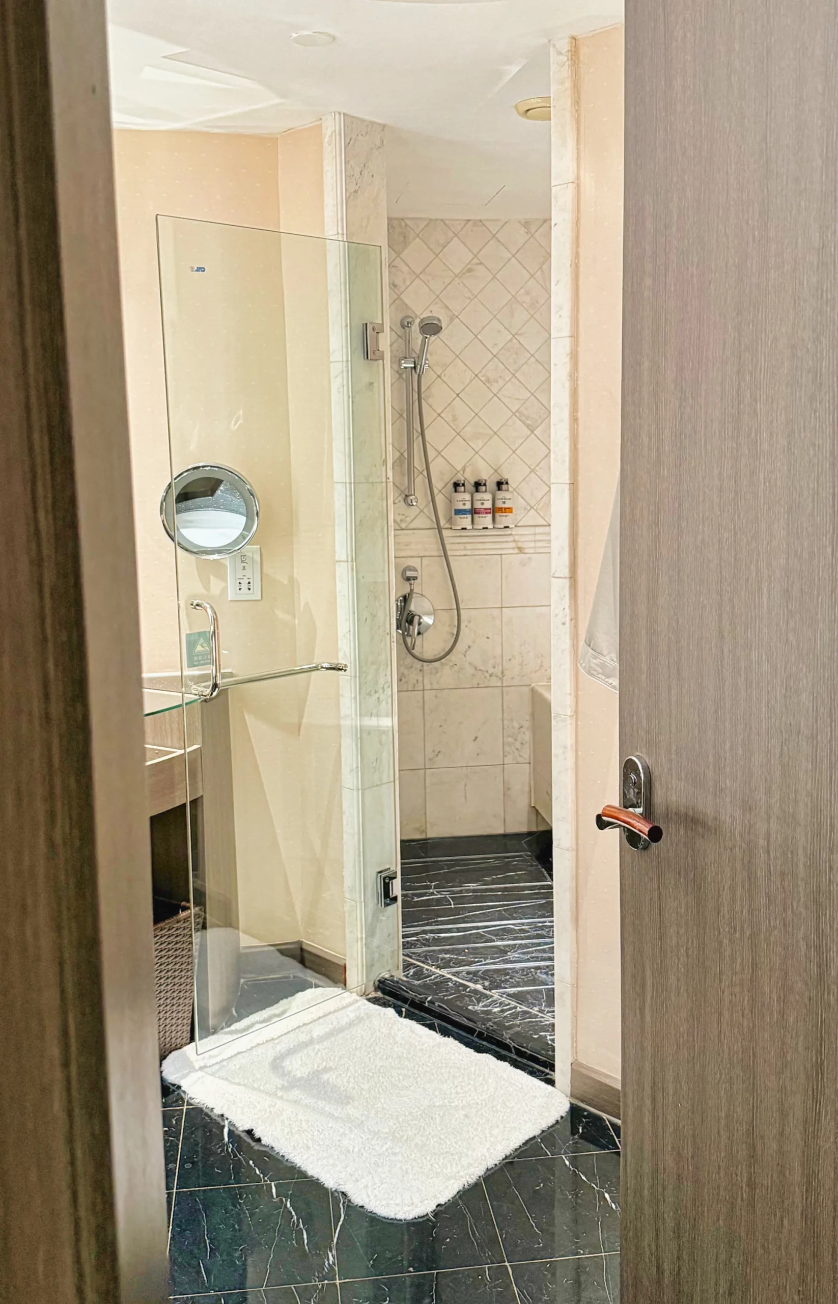 The spacious bathroom with a separate bathtub and shower.