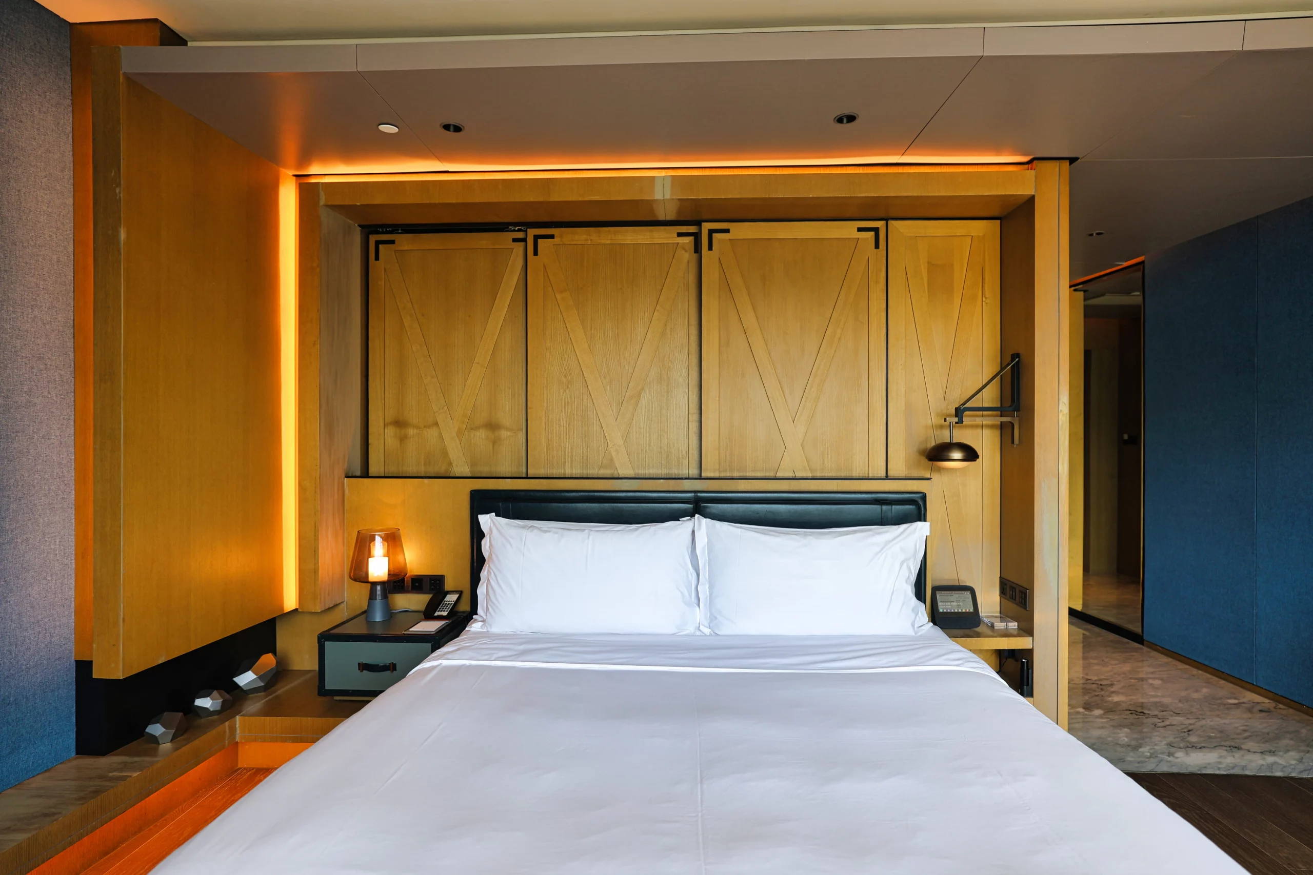 Comfortable and modern hotel bedroom interior.