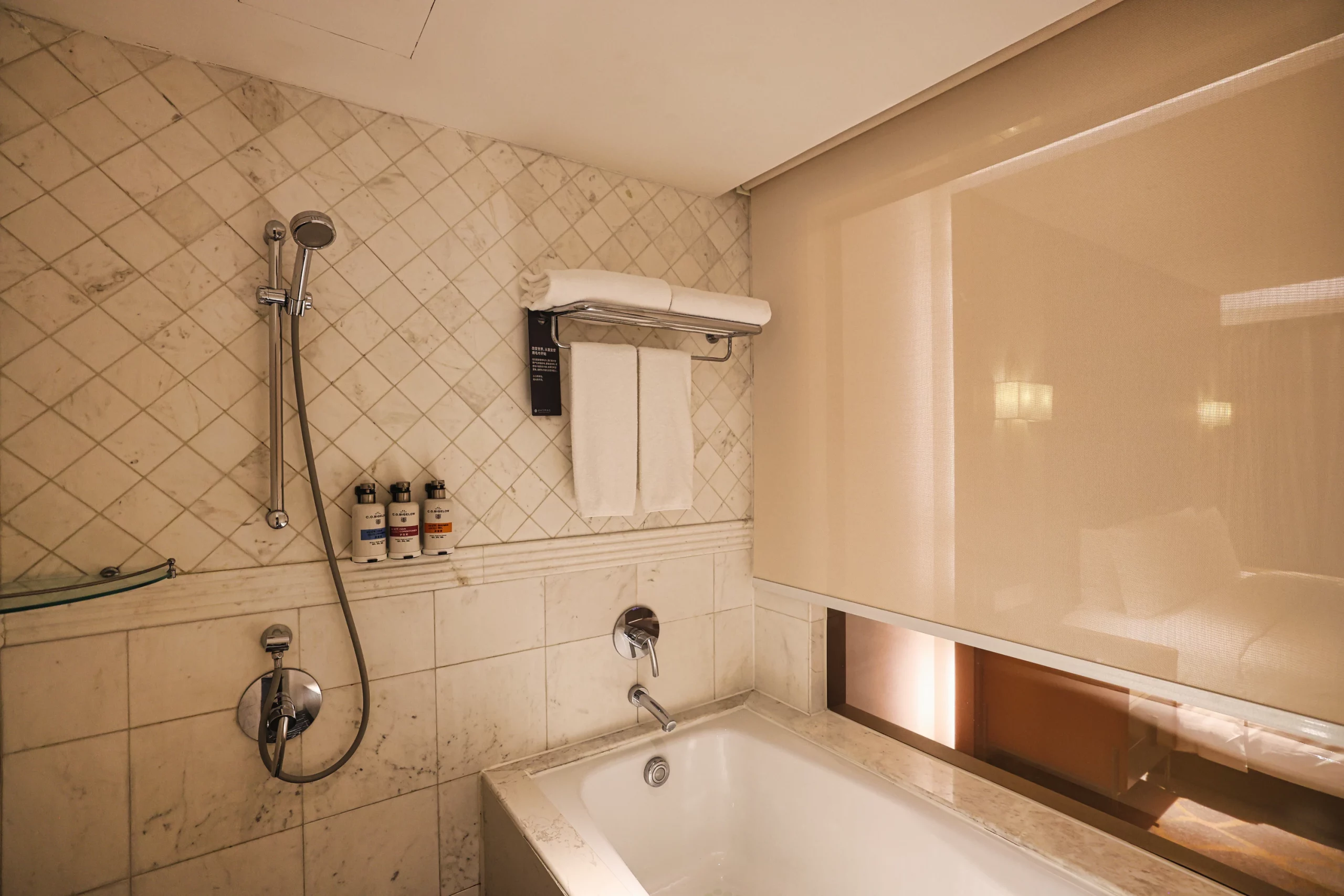 The walk-in shower with a rainfall showerhead.