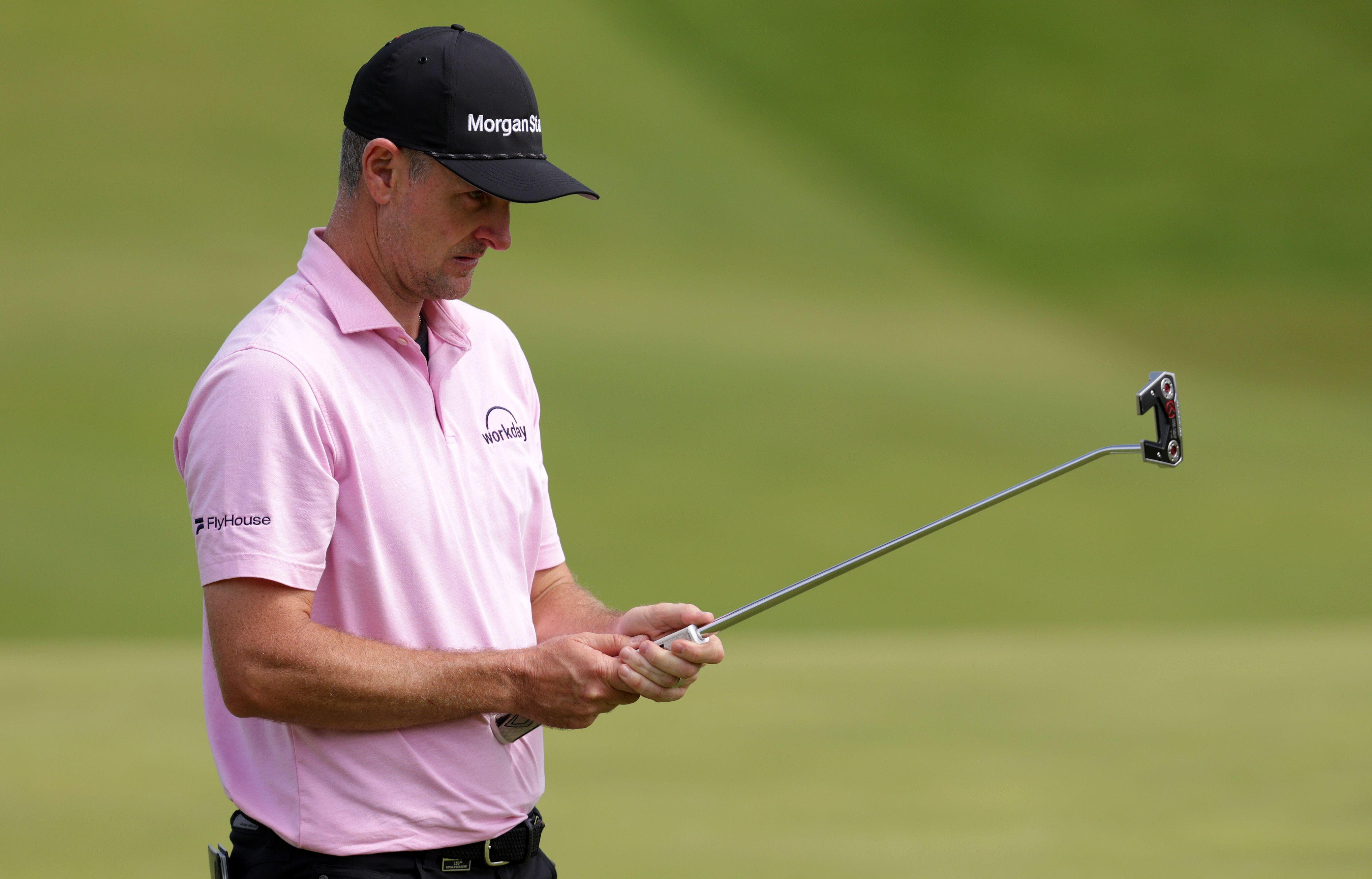 Justin Rose studies the line of his putt on the 9th green at this years Open Championship.
