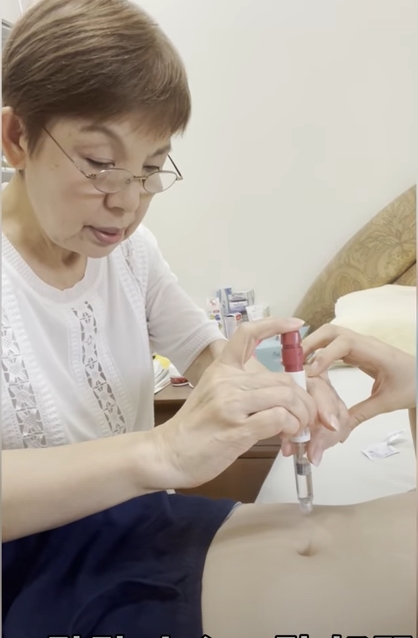 劉媽媽幫劉品言打排卵針很緊張。(圖/翻攝自YT)