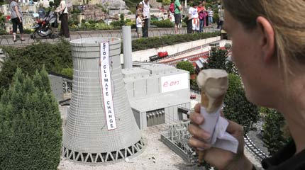 The Lego replica of Kingsnorth power station complete with 'Stop Climate Change' banner