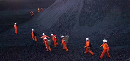 Greenpeace activists disrupt coal loading at the world's largest coal port 