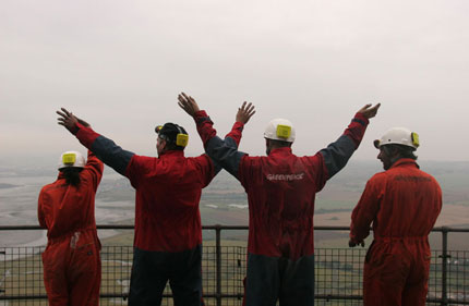 Greenpeace volunteers at the top of Kingsnorth's chimney