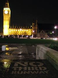 Stop Heathrow: clean grafitti in Parliament Square