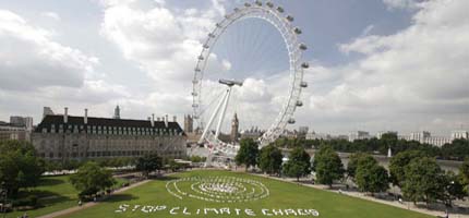 Volunteers' bodies spell out "STOP CLIMATE CHAOS" under the London Eye