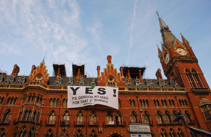 A Greenpeace banner says 'yes!' to the new international terminal at St Pancras station