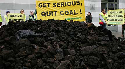 Greenpeace activists tell major global polluters in Poland to "Get Serious, Quit Coal".