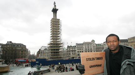 Brian Baring a traditional landowner from Papua New Guinea by Nelsons Column where illegal timber was used during renovations