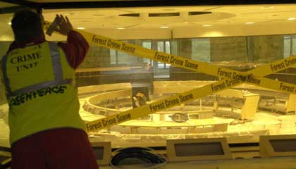 Greenpeace activists search for illegal indonesian plywood at EU social and general HQ, Brussels