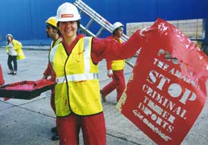 Tilbury  Docks - Greenpeace activists brand illegally logged timber