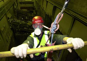 A Greenpeace climber inside Sheffield incinerator