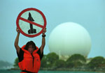 Greenpeace protester outside Menwith Hill spy base