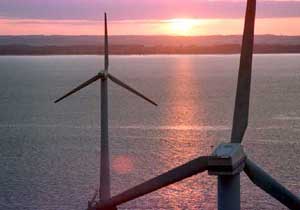 wind turbines at sunset