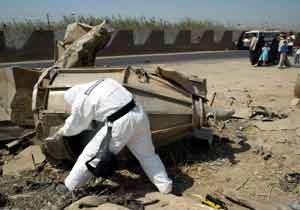 Greenpeace scientist Dr Rianne Teule measures radioactive levels