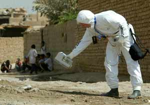 A Greenpeace radiation expert takes measurements