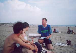 A Greenpeace volunteer polling beachgoers at Porthcawl