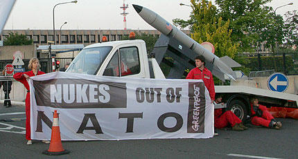 Greenpeace activists block NATO's Brussels HQ with a full-size replica of a US B61 nuclear bomb
