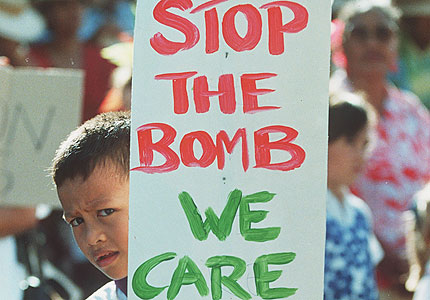 Protesters march against against French nuclear testing in the South Sea Islands in 1995