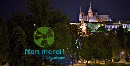 A projection near Prague Castle says 'Non merci' to nuclear power