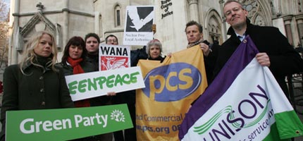 Green groups gather outside the High Court as the government's energy review goes on trial