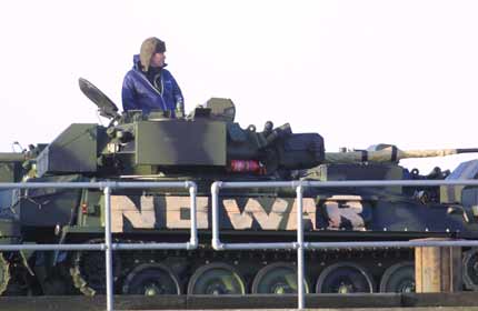 'No war' stencilled on tank at peace camp