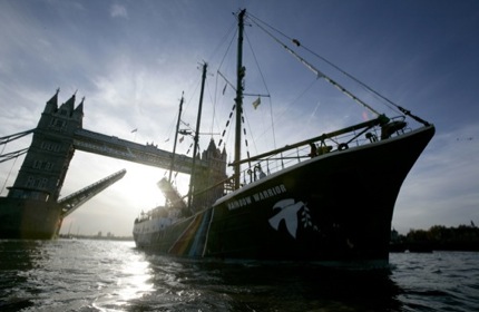 Greenpeace flagship Rainbow Warrior coming through Tower Bridge