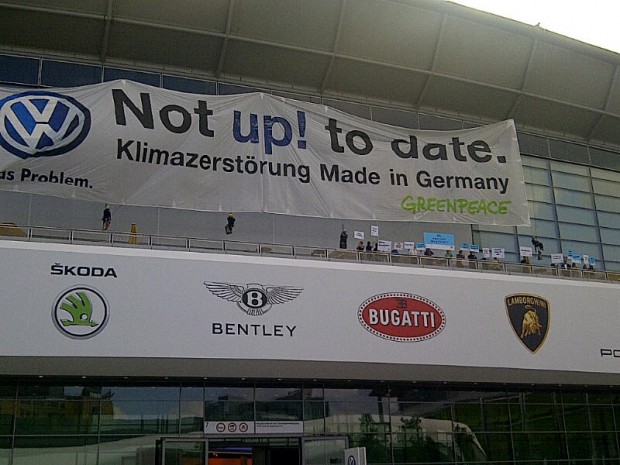 Our banner at Frankfurt Motor Show and VW's counter protest!