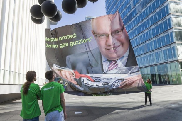 Banner outside meeting of European environment ministers in Luxembourg