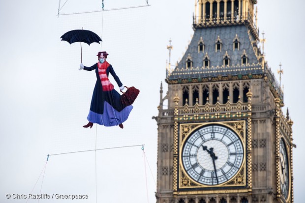 Mary Poppins in air pollution mask over Westminster to highlight air pollution