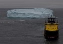 Cairn's tugs drag icebergs out the way of its Arctic oil drilling rig