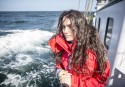 A picture of Marcela, member of GPUK oceans team, onboard the Beluga II boat 