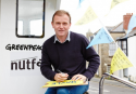 George Eustice signing a Greenpeace petition asking the Government to reallocate