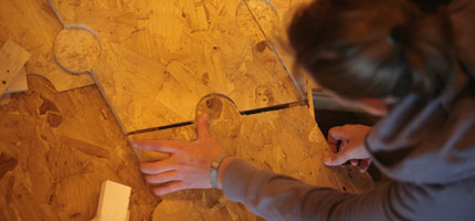 Person working with plywood