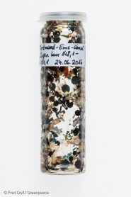 Bottle filled with microbeads
