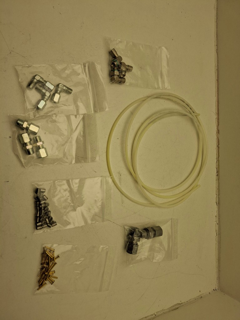 16.69859-0660 Man Roland parts assortment for folding cylinder lubrication