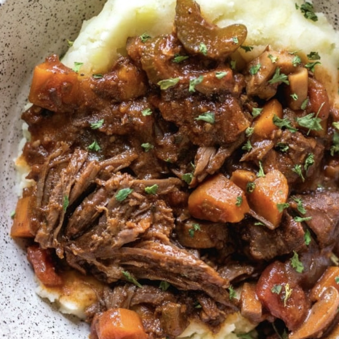 1 serving Shredded Beef Ragu over potatoes