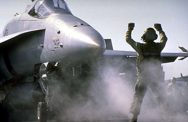 McDonnell - Douglas F-18C "Hornet" and Deck Crew