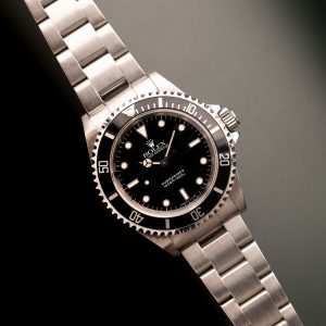 1997 Rolex 14060 Submariner - Box & Paper - Image 1