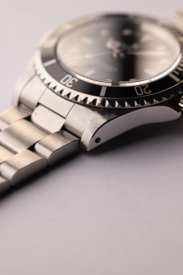 1997 Rolex 14060 Submariner W/Tag & Paper