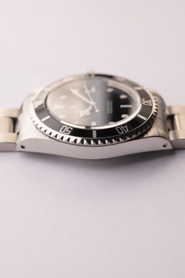 1997 Rolex 14060 Submariner W/Tag & Paper