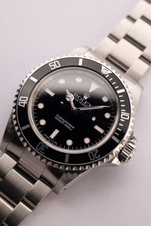 1997 Rolex 14060 Submariner W/Tag & Paper