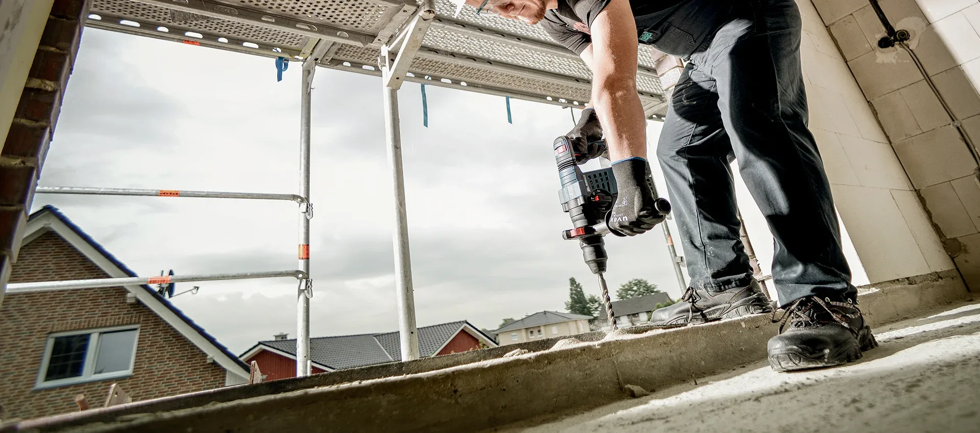 Man drilling concrete