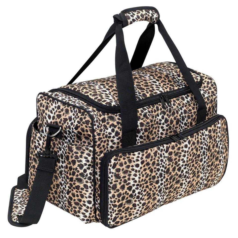 Leopard print grooming tote bag for storing tools and supplies at a salon.